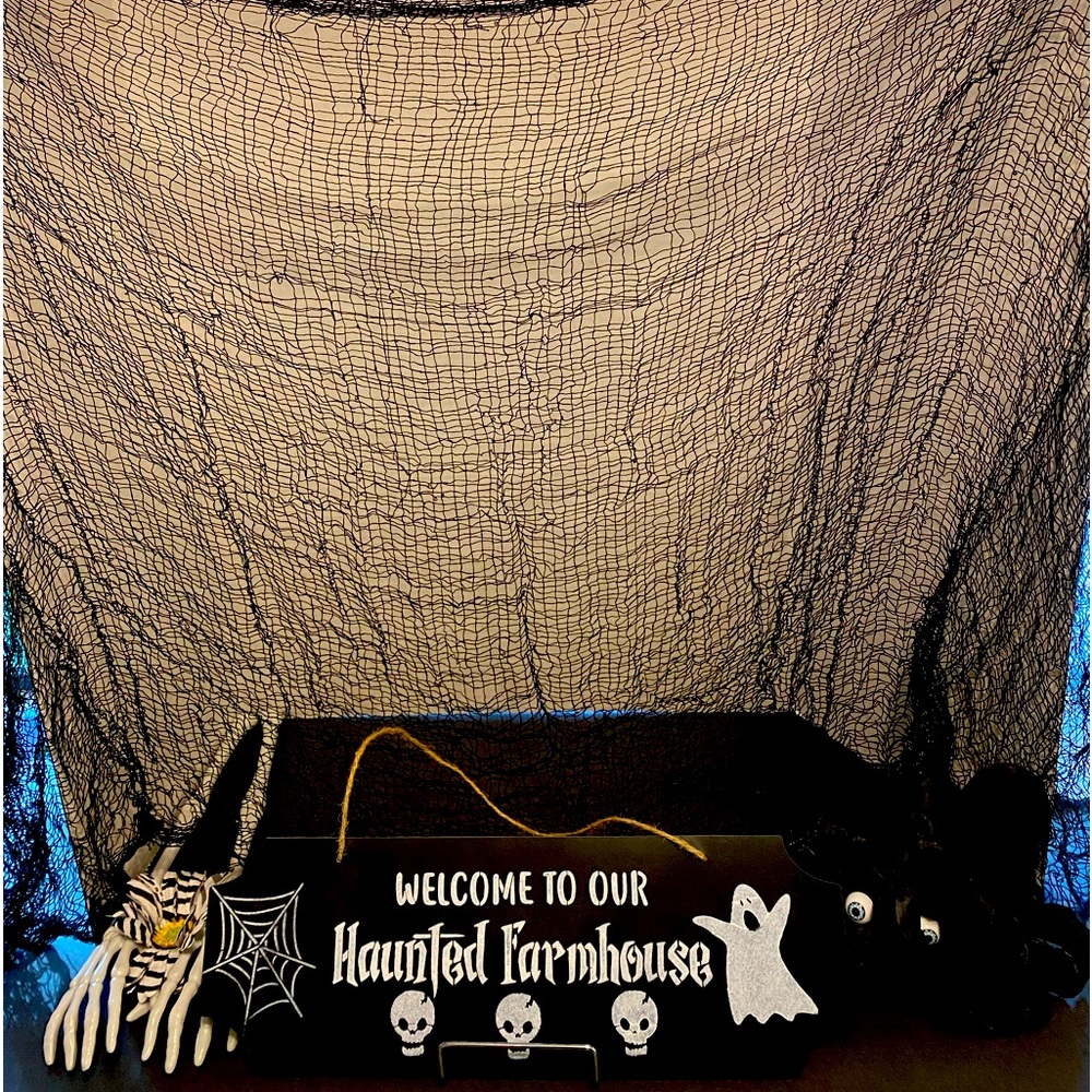 Welcome to our Haunted Farmhouse sign